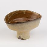Chris Carter (born 1945), a thrown and altered footed stoneware bowl, impressed mark, 10.