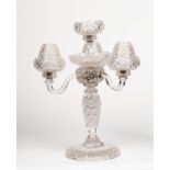 A 1930s cut glass crystal three-branch, four-light table light,