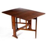 Arthur Simpson of Kendal (1857-1922)/An oak occasional table with two folding flaps and gate legs,