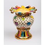 Mary Rose Young (Contemporary), an ornate pottery candle holder, handpainted in colours and gilding,
