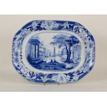 A Wedgwood blue and white well dish with port scene by Claude Lorraine,