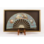 A Regency fan with painted vignettes of figures in landscapes within a surround of garlands and
