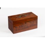 A George III mahogany tea caddy with brass handle to the cover,