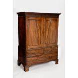 A late 18th Century Chippendale period dwarf linen press with blind fret frieze,
