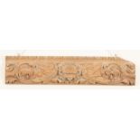 An 18th Century lime wood frieze panel, carved griffin, scrolls etc, 62cm wide,