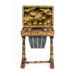 A fine Regency black and gold lacquer worktable,