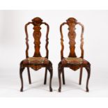 A pair of early 18th Century Dutch marquetry high back single chairs, inlaid flowers,