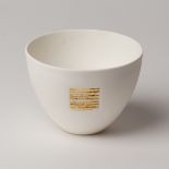 Angela Mellor (Contemporary), a white bone china paperclay sake cup with textured gold square motif,