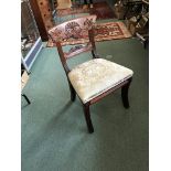 A Regency mahogany single chair with carved cresting rail and horizontal splat,