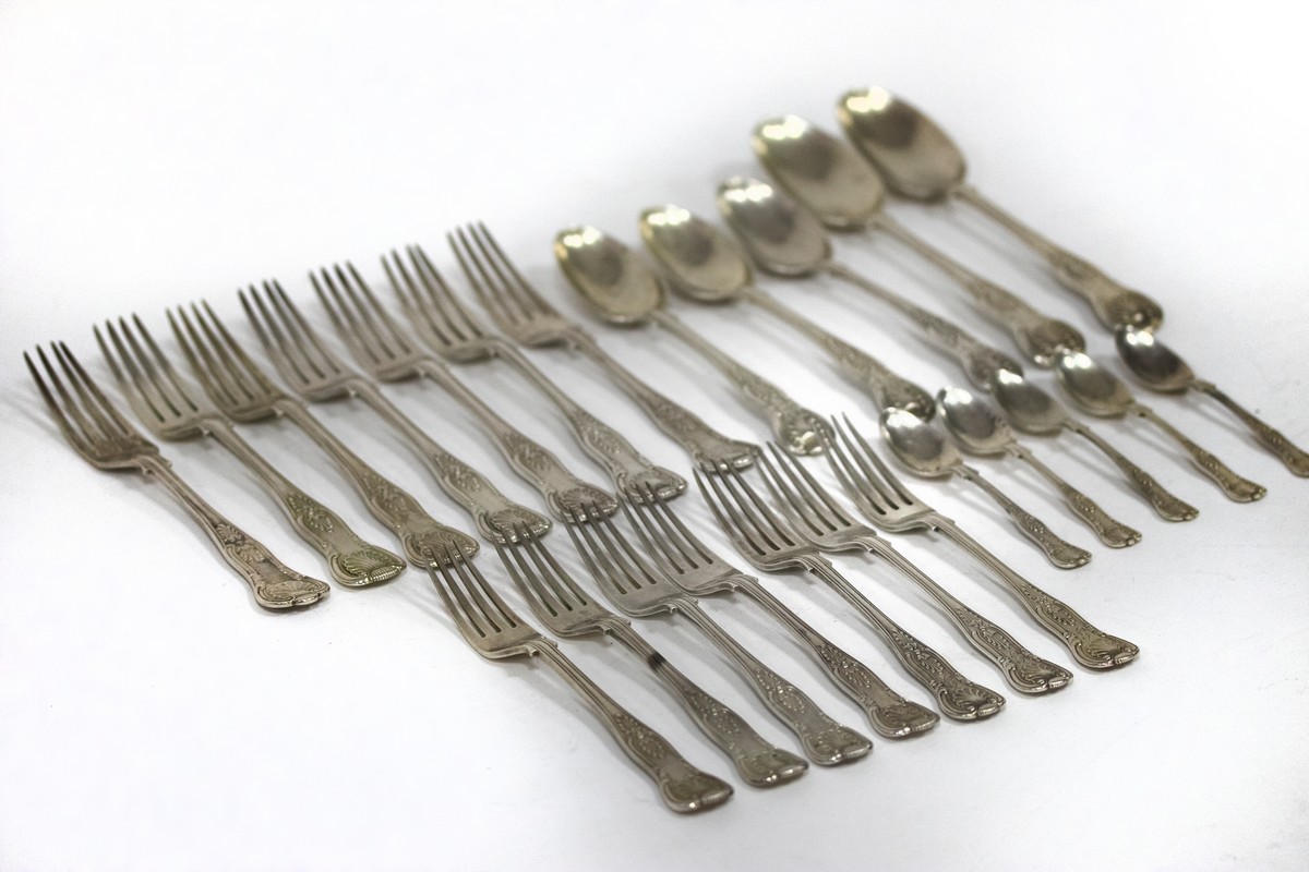 A quantity of King's pattern silver flatware, various dates and makers, comprising a pair of