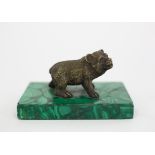 A bronze figure of a bear on a malachite plinth