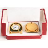 A Cartier alarm clock, 8cm high and a picture frame en-suite,