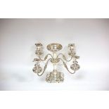 A silver plated epergne with four candle sconces, on a lobed quatrefoil base, 30cm high