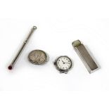 A silver scent bottle case with engine turned decoration, a silver swizzle stick,