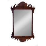 A large George II walnut fret framed mirror, circa 1750,