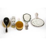A pair of silver and tortoiseshell backed hairbrushes, London 1919,