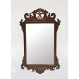 A George III mahogany carved wall mirror with ho ho bird to cresting,