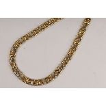 A French gold necklace by Caplain, Paris, of flattened fancy links,