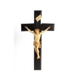 A 19th Century Dieppe ivory crucifix, the carved figure of Christ to an ebony cross, 40.