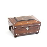 A Regency rosewood and mother-of-pearl inlaid workbox of sarcophagus shape,