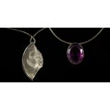 A Lalique 'Acrobate' pendant necklace set in silver,