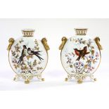 A pair of Derby Crown moon flasks decorated birds,