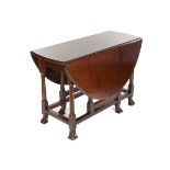An early 18th Century mahogany gateleg table,
