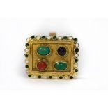 A multi gem set ring in 18k yellow gold, the rectangular plaque set with turquoise,