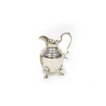 A George II silver jug, maker's mark rubbed, London 1738,