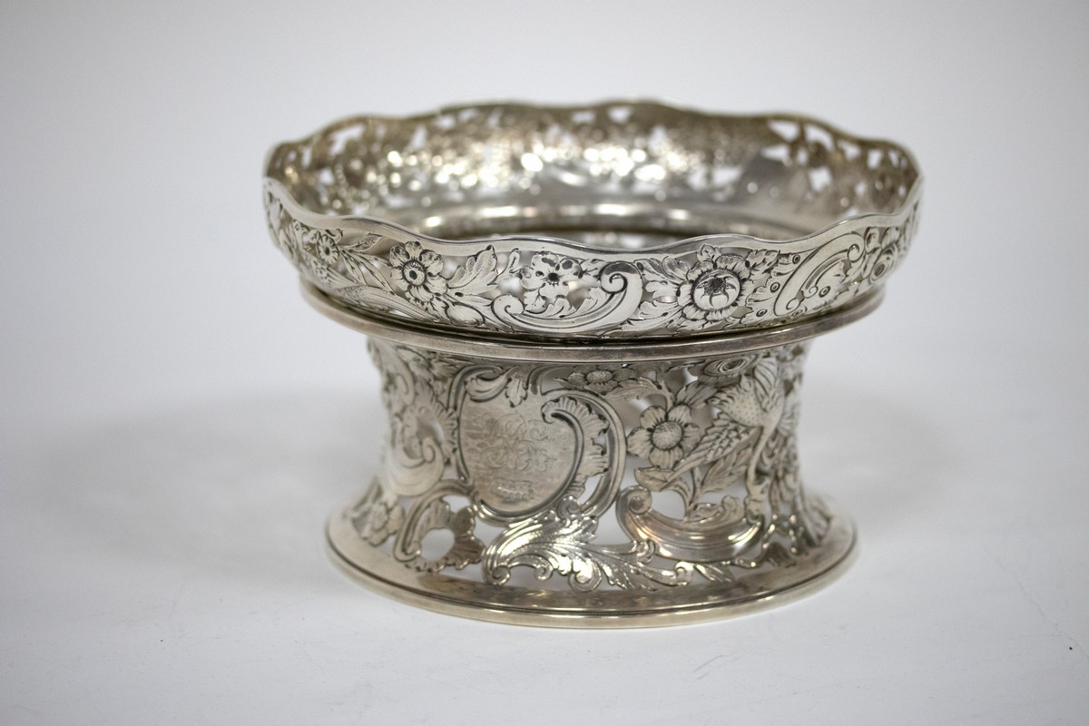 An Edwardian silver dish ring, John Bodman Carrington, London 1903, in two sections with pierced and