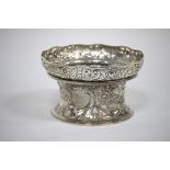 An Edwardian silver dish ring, John Bodman Carrington, London 1903, in two sections with pierced and