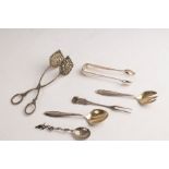 A small quantity of Continental silver including 800 standard spoon and fork, tongs, sugar nips etc.