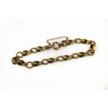A 9ct yellow gold fancy link bracelet, with safety chain, approximately 12.