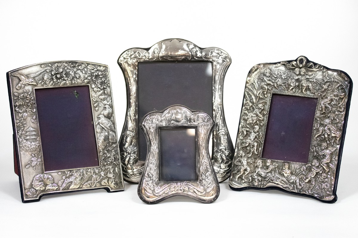 A silver photograph frame, M&LS, London 1991, of chinoiserie design, to take a photograph 16cm x