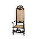 A William and Mary ebonised beech high cane back armchair, circa 1690,