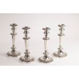 A set of four mid-19th Century silver plated candlesticks, 25cm high