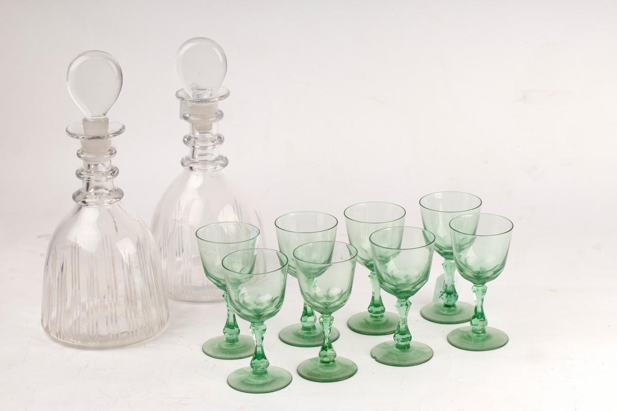 A pair of triple-ring neck decanters and stoppers,