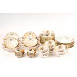 Eight Royal Crown Derby two-handled soup bowls and stands,