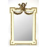 A Regency parcel gilt mirror with quiver and flame finial within a garland and ribbon tie gesso