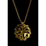 An 18ct yellow gold pendant of modern design, maker SI, circa 1980, approximately 37.