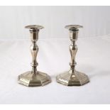 A pair of Edwardian silver candlesticks, Sheffield 1901, of octagonal baluster form, 16.5cm high,