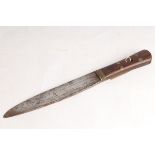 A late 19th Century Middle Eastern dagger with faintly engraved blade, total length 38.