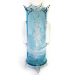A Mary Gregory type blue glass vase with white enamel decoration,