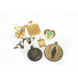 A heart-shaped brooch,