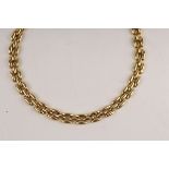 An Italian 18ct gold necklace of oval links, import marks, 43cm long,