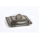 An Edwardian silver entrée dish and cover, HA, Sheffield 1901, of rectangular shape with gadroon
