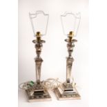 A pair of silver plated candlesticks, Walker & Hall, of neoclassical column form, fitted as lamps,