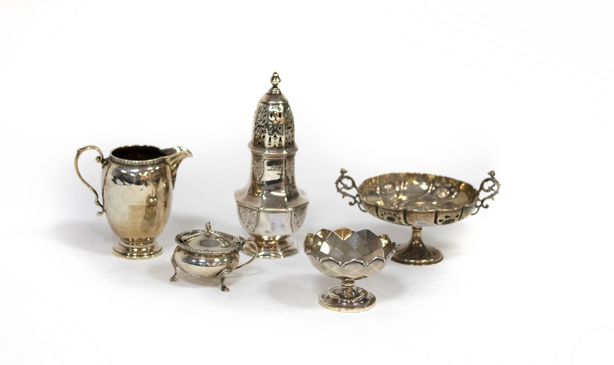 A Queen Anne style silver sugar caster, London 1902, 20cm high, a silver jug,