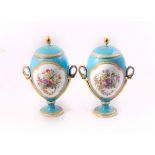 A pair of ovoid porcelain vases and covers, circa 1860,