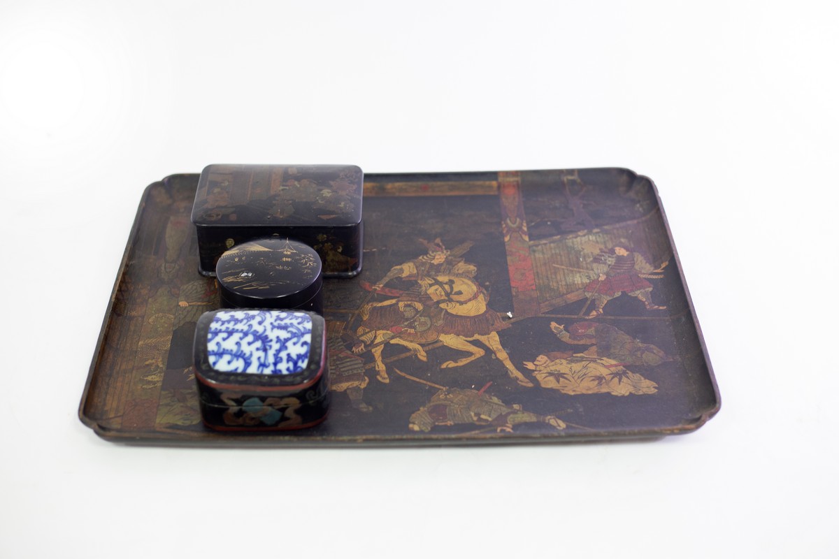 A papier-mâché tray decorated Samurai,